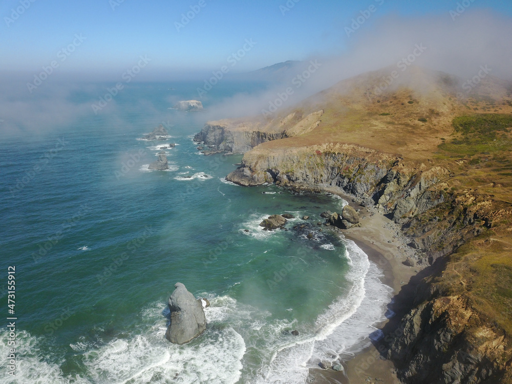The cold Pacific Ocean washes onto the beautiful coastline of Northern California near Jenner. The Pacific Coast Highway runs right along this scenic region in Sonoma County.