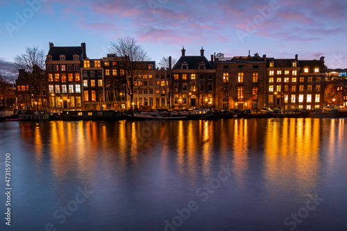 City scenic from Amsterdam at the Amsteldijk in the Netherlands at sunset