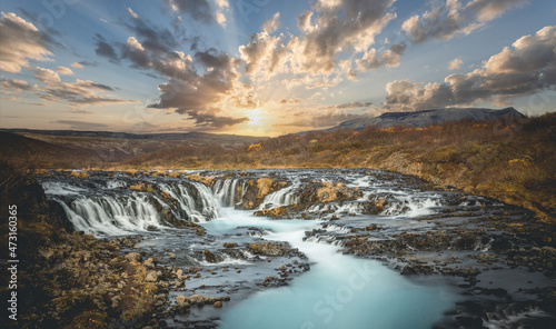 Colorful sunset at the Bruarfoss waterfall in south Iceland  with blue water