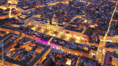 Aerial drone night shot of iconic masterpiece elliptic square - Piazza Navona, Rome historic centre, Italy © aerial-drone