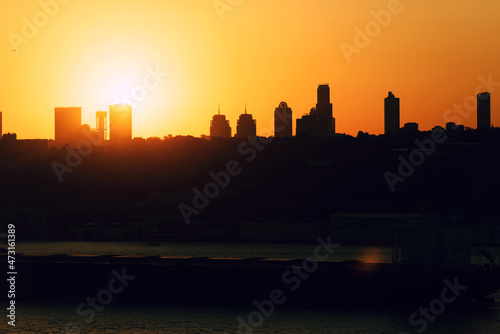 Sunset behind buildings in istanbul.