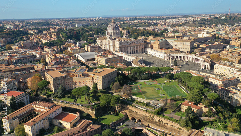 Aerial drone photo of iconic masterpiece Saint Peter Basilica and whole city of Vatican the biggest church in the world, Metropolitan city of Rome, Italy