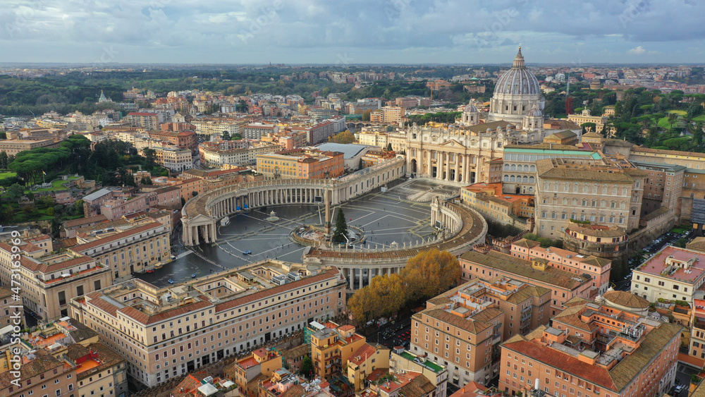 Aerial drone photo of iconic masterpiece Saint Peter Basilica and whole city of Vatican the biggest church in the world, Metropolitan city of Rome, Italy