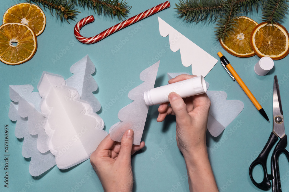 How to make origami volumetric Christmas tree from white paper craft