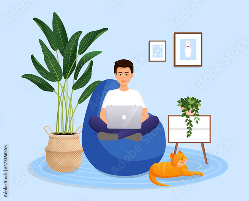 Man is sitting on a bean bag chair at home at a laptop computer. Remote work, office at home, programming, freelance. Study at home in quarantine. Vector illustration. Cozy interior with a cat.