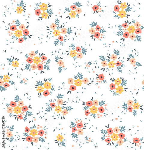 Beautiful floral pattern in small abstract flowers. Small colorful flowers. White background. Ditsy print. Floral seamless background. The elegant the template for fashion prints. Stock pattern.