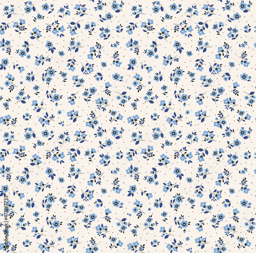 Vintage floral background. Floral pattern with small blue flowers on a ivory white background. Seamless pattern for design and fashion prints. Ditsy style. Stock vector illustration.