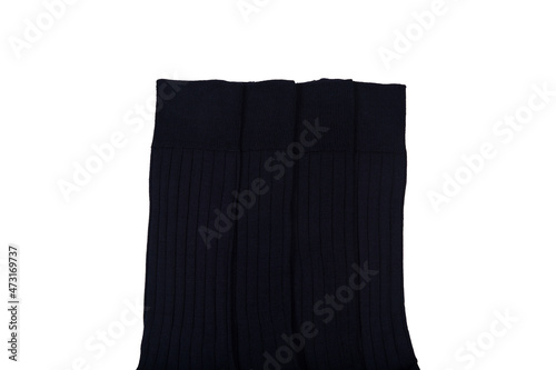 Clothes made of socks, knitwear. Many colorful socks in the form of a panorama. Socks of different sizes for cold seasons. Clothing for autumn and winter. Knitted socks on a white background.