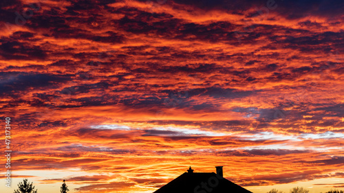 Colorful cloudy sky at sunset. Dramatic sunset sky with clouds. Sky texture, nature background.