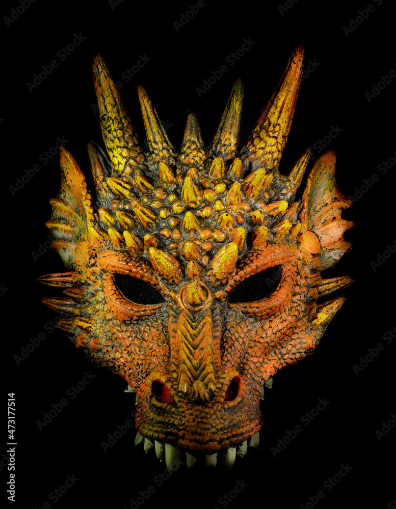 3D Dragon Mask Isolated Against Black Background
