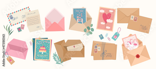 Set of envelopes, post cards, post stamps, craft paper letters and mail envelopes top view