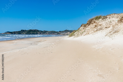 Beach with dunes and vegetation