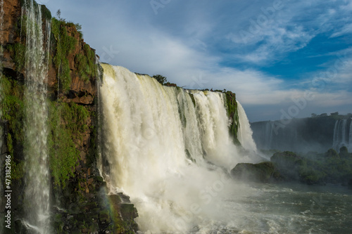Beautiful view of a large waterfall at Iguazu Falls from brazilian side, one of the Seven Natural Wonders of the World - Foz do Iguaçu, Brazil