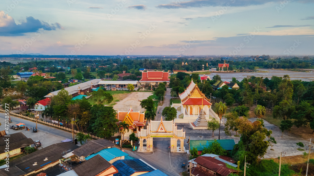 Chon Buri, Thailand, November 21, 2021 : Wat Luang Phrommawat.  There have been bats and hens living in the trees in the temple for a long time.