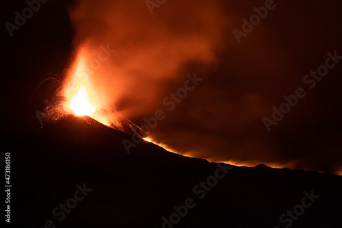 Cumbre Vieja / La Palma (Canary Islands) 2021/10/28. Long exposure nigh shot of the Cumbre Vieja volcano eruption. The main cone of the volcano, the two most active lava vents, and the main lava flow.