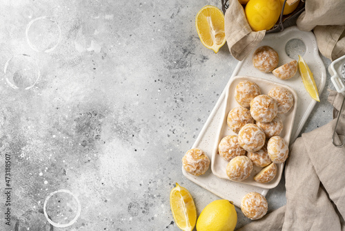 Lemon gingerbread in a white plate on a light gray culinary background. Delicious homemade cookies top view. Copyspace photo