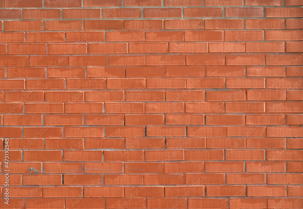 Obraz premium Background. New Red Brick Wall closeup.