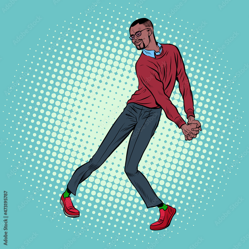 Obraz premium african young man dancing, stylish clothes. Freedom and fan, love of music