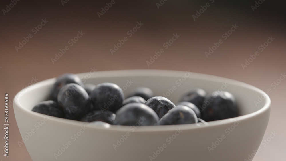 fresh blueberries in white bowl fresh blueberries in white bowl