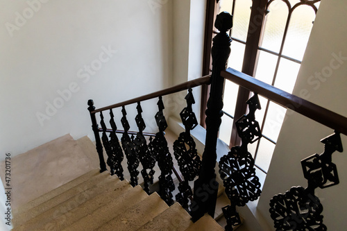 Interior staircase from Oradea synagogue decorated with railing made of wrought iron. Oradea, Romania photo