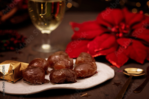 Glazed chestnuts,  traditional french sweets for winter holidays celebration. Cristmas dessert, festive dinner concept photo
