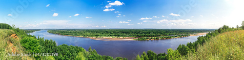panorama of the river on a sunny summer day