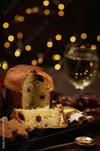 Panettone, pandoro, gingerbread, glazed chestnuts, traditional Christmas sweets for winter holidays celebration. Cristmas desert, festive dinner concept