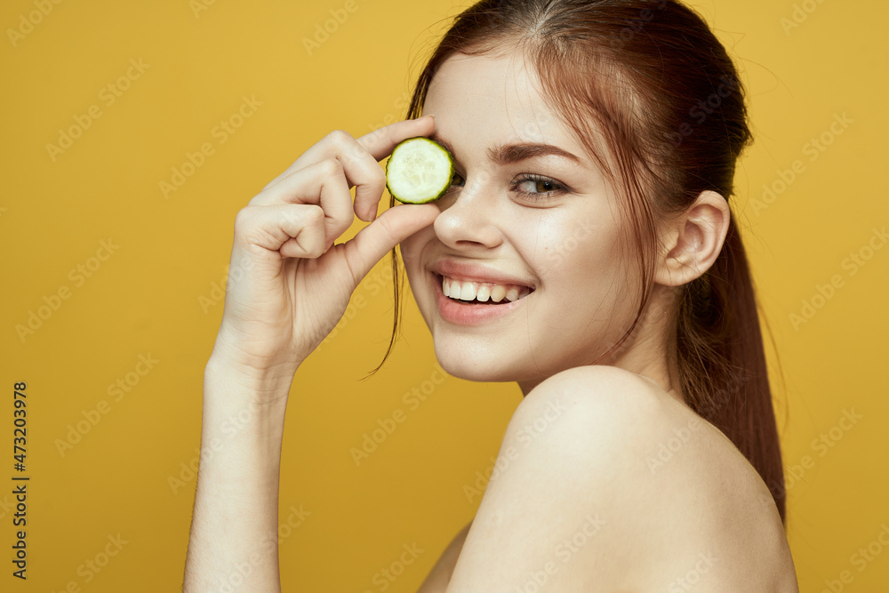 cheerful woman with cucumber vitamin skin care natural product cheerful woman with cucumber vitamin skin care natural product