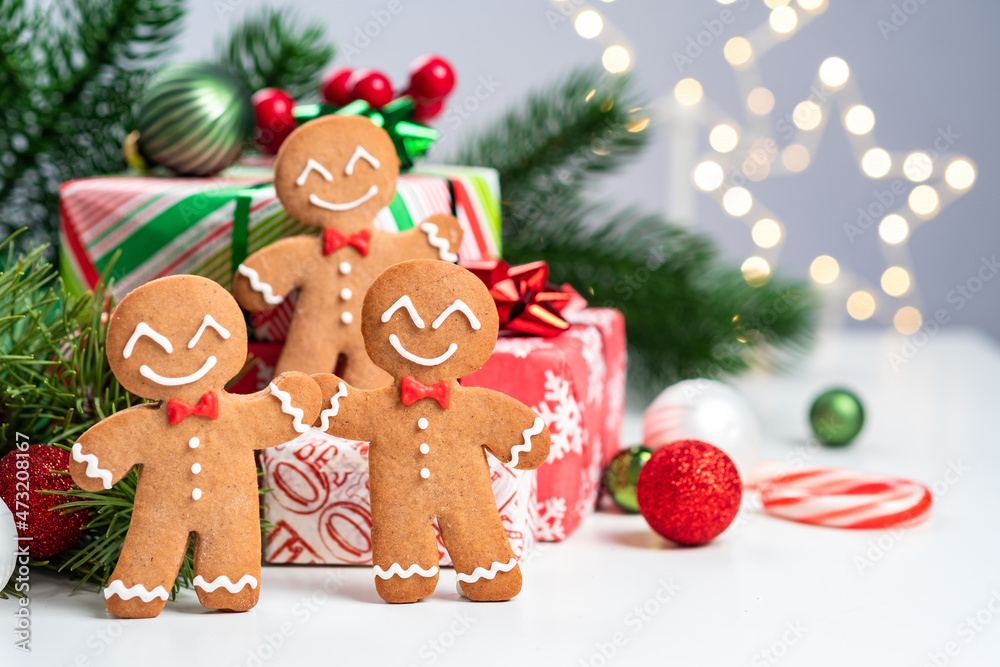 Christmas Decorations with Gingerbread man and Gift Box. Traditional holiday symbol. Christmas design. Christmas Decorations with Gingerbread man and Gift Box. Traditional holiday symbol. Christmas design.