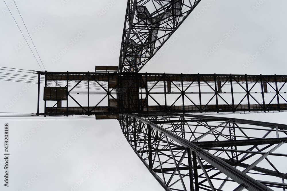 Transporter Bridge over the Charente river under a cloudy sky. National monument. Rochefort sur mer. France