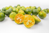 Fresh little limes on pure white background