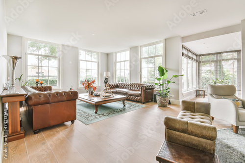 Canvas Print Luxurious living room with soft sofa and armchairs