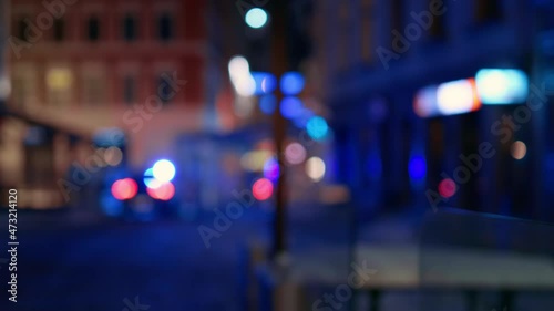 Wallpaper Mural Police car or ambulance moving along city streets with flashing siren lights Torontodigital.ca