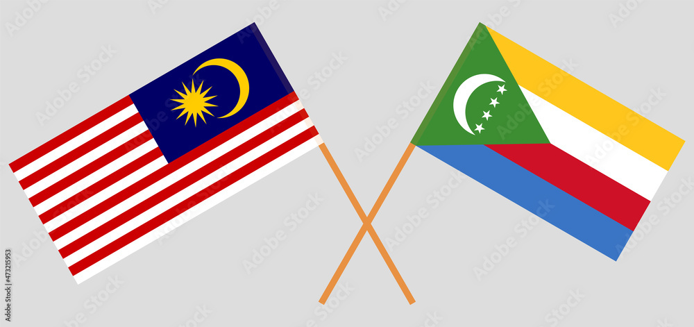 Crossed flags of Malaysia and the Comoros. Official colors. Correct proportion Crossed flags of Malaysia and the Comoros. Official colors. Correct proportion