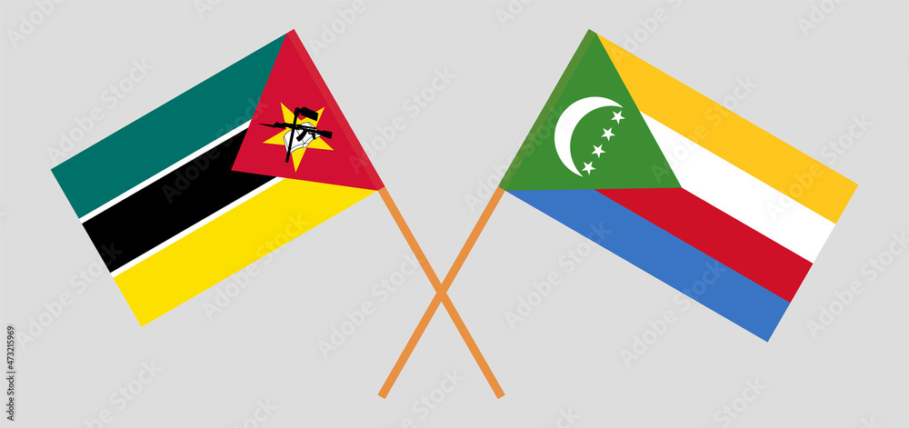 Crossed flags of Mozambique and the Comoros. Official colors. Correct proportion Crossed flags of Mozambique and the Comoros. Official colors. Correct proportion