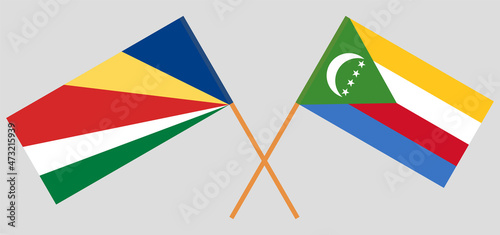 Crossed flags of Seychelles and the Comoros. Official colors. Correct proportion
