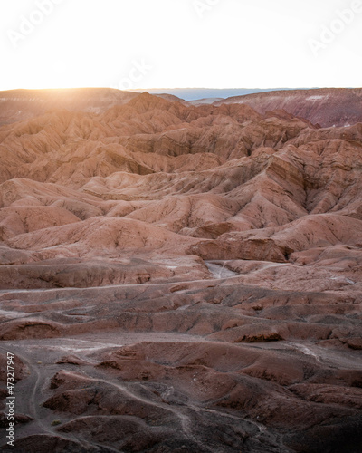 A landscape that looks like mars, with red mountains at sunset in the desert of Atacama, Chile