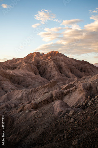 A red mountain, on a landscape similar to mars, at sunset, in desert of Atacama, Chile
