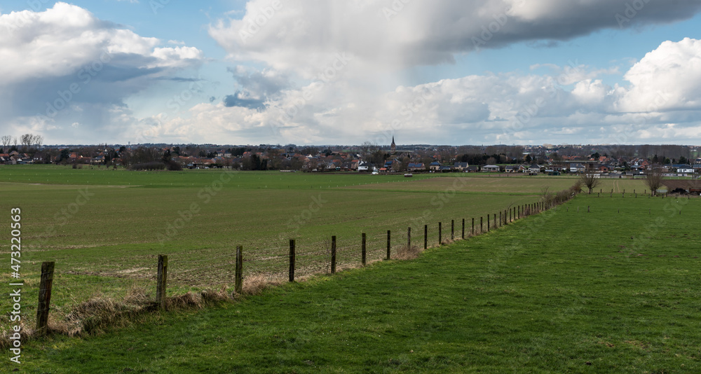 Panoramic view over green meadows around Linter, Flanders, Belgium