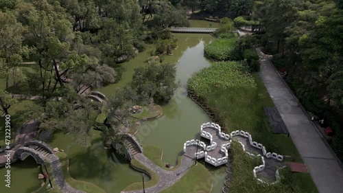 Aerial View Of Toa Payoh Town Park Landscaped Pond With Bridges In Singapore. - ascend photo