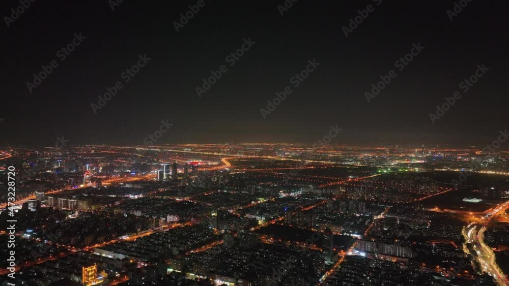 Shanghai cityscape in the night with lights from buildings and traffic. Travel, business and city life concept b-roll footage Shanghai China, Traffic light bands in the city. Buildings and landmarks Shanghai cityscape in the night with lights from buildings and traffic. Travel, business and city life concept b-roll footage Shanghai China, Traffic light bands in the city. Buildings and landmarks