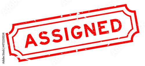 Grunge red assigned word rubber seal stamp on white background