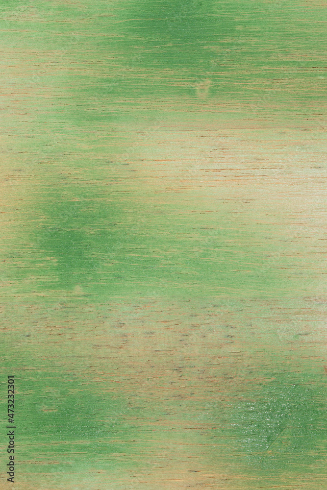 Green and white textured wooden plank background.