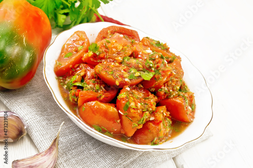 Tomatoes Korean in plate on board