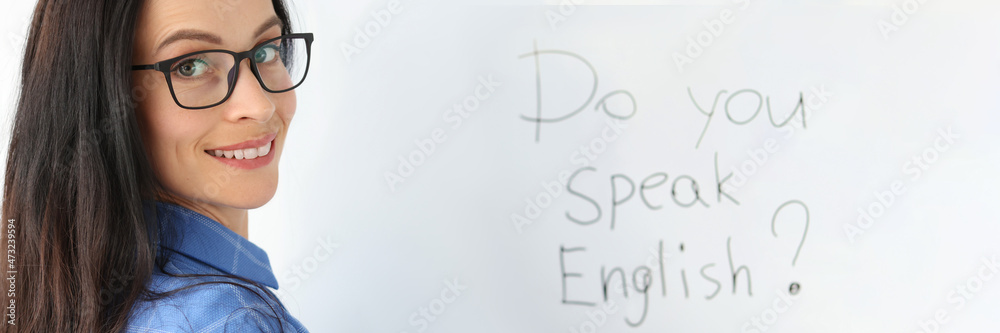 Lettering do you speak english on white board closeup Lettering do you speak english on white board closeup