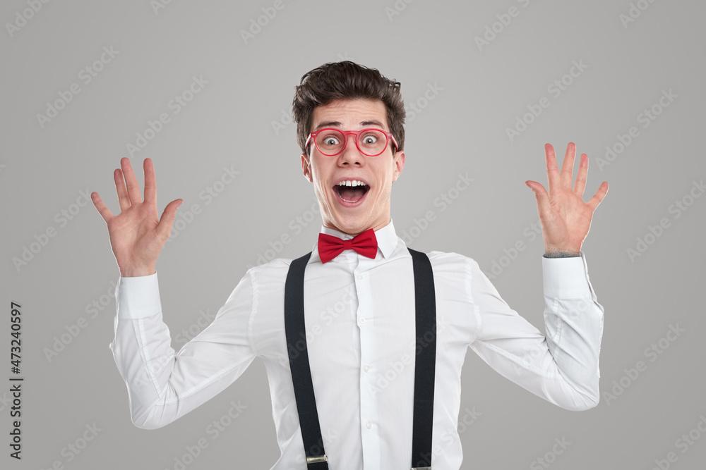 Surprised funny nerd looking at camera