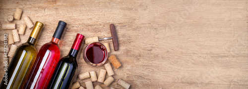 wine  bottles on wooden background.