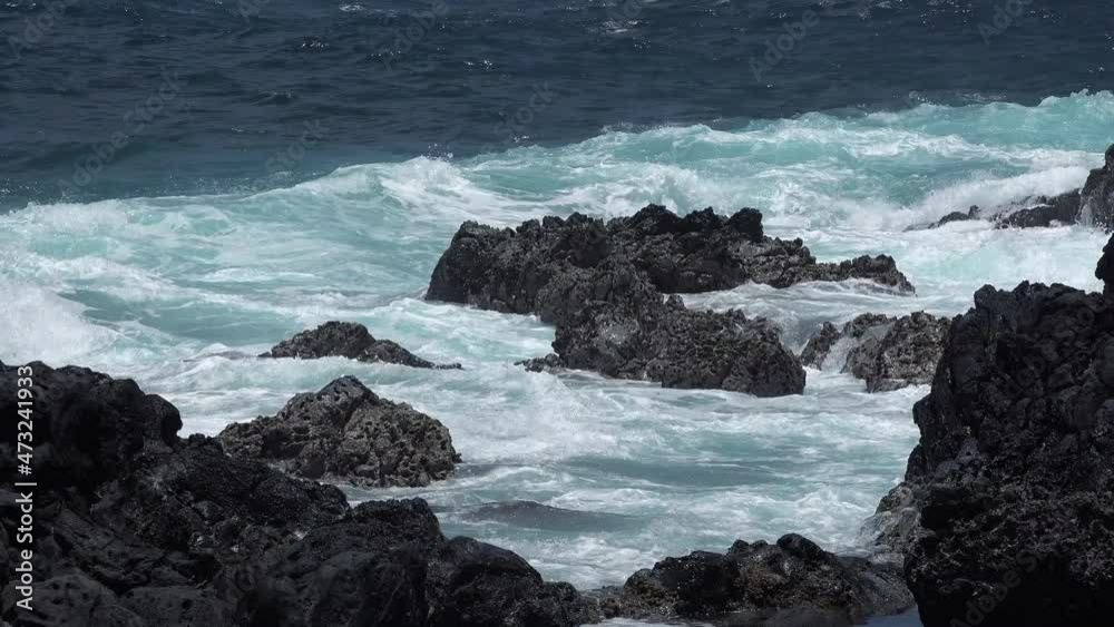 Ocean Waves Crashing onto Rocks in Hawaii. Ocean Waves Crashing onto Rocks in Hawaii.