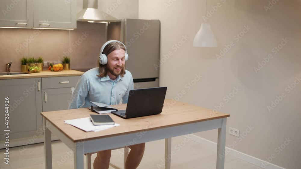 Handheld, remote work, male manager is late for an online meeting on a video conference, a funny image of a person at a remote job. Handheld, remote work, male manager is late for an online meeting on a video conference, a funny image of a person at a remote job.