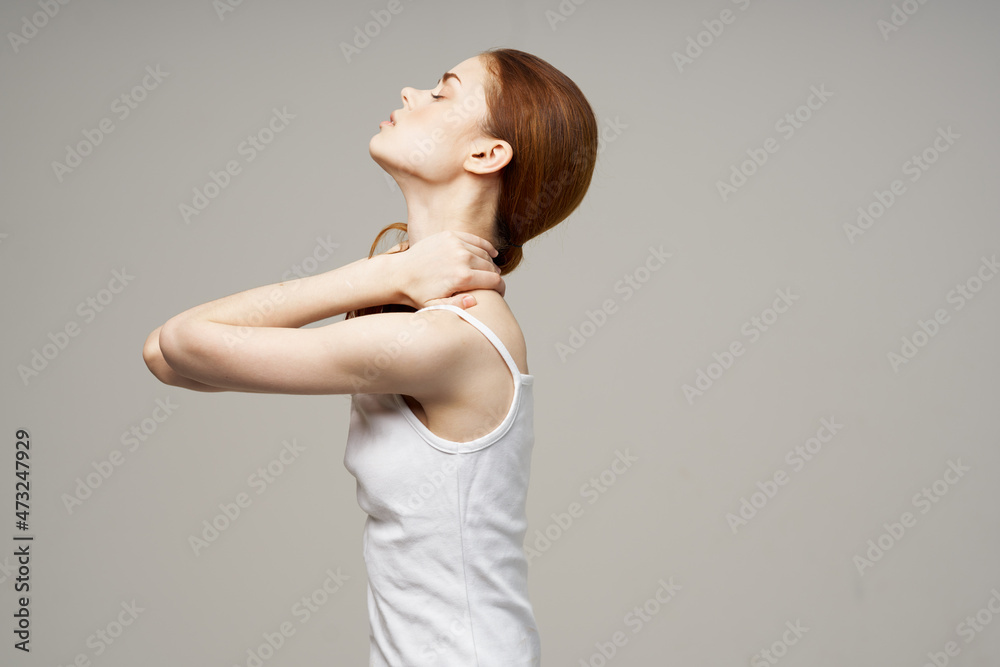 woman holding on to the neck health problems joint studio treatment woman holding on to the neck health problems joint studio treatment